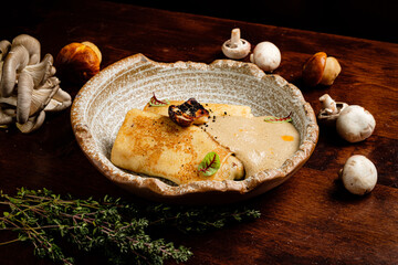 Fototapeta premium pancakes with mushrooms and herbs