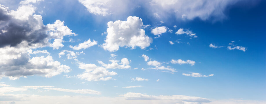 wide angle panorama of a blue sky. white clouds on a sunny weather. atmosphere air freedom concept. nature series in spring. creative gradient background for installation and design