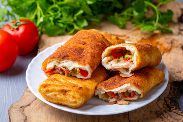Turkish Pacanga Boregi with pastirma (pastrami) and cheddar (melted) cheese. - Pastirmali Borek