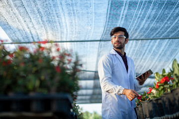 Portrait of a scientist working in agriculture research. organic testing Botany in Plant Growth.