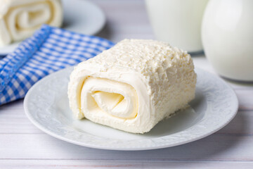 Turkish creamy dairy product. Clotted cream (butter cream) for Turkish breakfast with glass of...