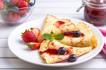 Fruit Pancakes. Strawberry Pancakes, Raspberry, Blueberry, and Chocolate topping