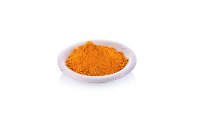 turmeric powder in a bowl isolated on white background
