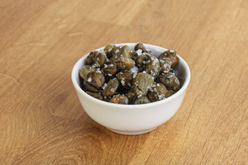 Salted marinated capers snack appetiser