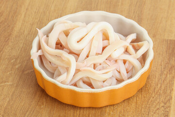 Marinated squid strips in the bowl