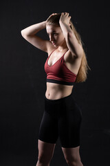 Fototapeta na wymiar Hands keeps girl his dumbbells head on his fitness black sports workout female, from fit exercise from active from trainer sportswear, people care. Weight beauty muscular, energy