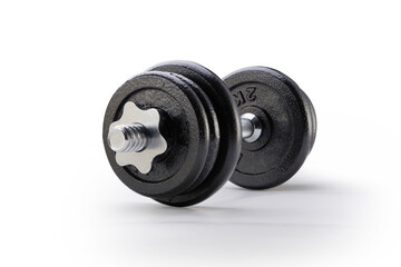 black metal dumbbell against white background with clipping path