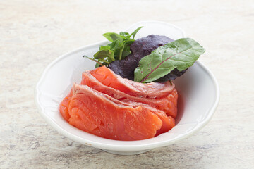 Sliced salmon fillet starter snack