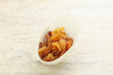 Sweet yellow raisin in the bowl