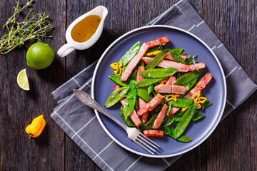 fried sugar snap peas with tuna slices