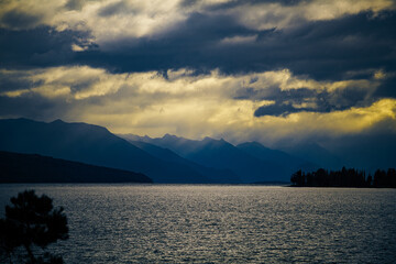Dramatic light over lake in the mountains