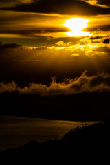 Intense sun light through clouds