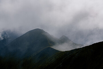 Mountain range in fog