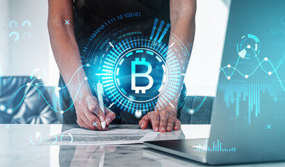 Businesswoman in formal wear is signing contract at office workplace