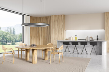 Fototapeta na wymiar Corner view on bright kitchen interior with island with barstools