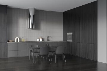 Corner view on dark kitchen room interior with dining table