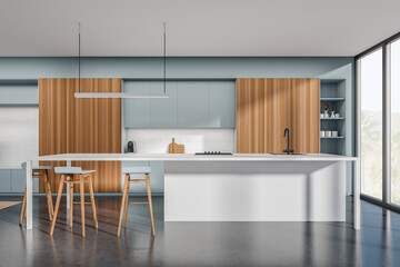 Front view on bright kitchen room interior with panoramic window