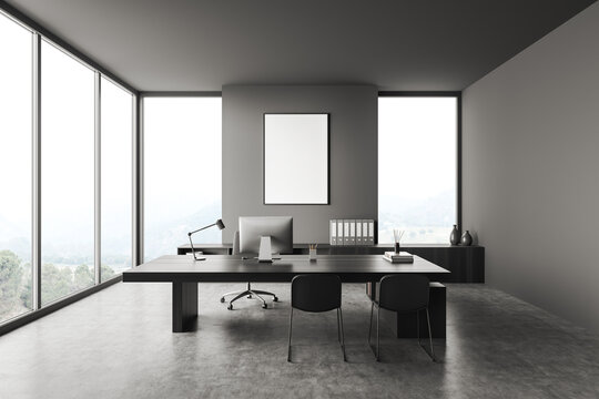 Grey manager room interior with desk and computer, drawer and mockup frame
