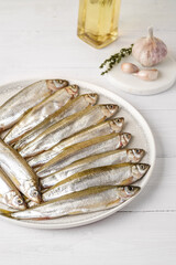 smelt raw on a plate