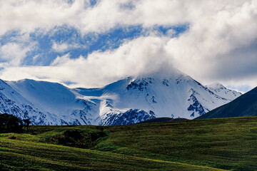 Fototapeta premium Snow covered peaks in mountain landscape