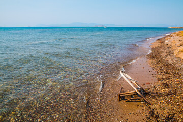 Coast of an uninhabited island northern Agistri island, Greece, with scraps