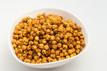 Kurkura Chana Dal Masala Namkeen Mixture Also Called Kurkure Kala Channa Dalmoth Nimki Is Made Of Bhuna Bengal Gram Roasted In Garam Masala Spices. Isolated On White Background With Copy Space