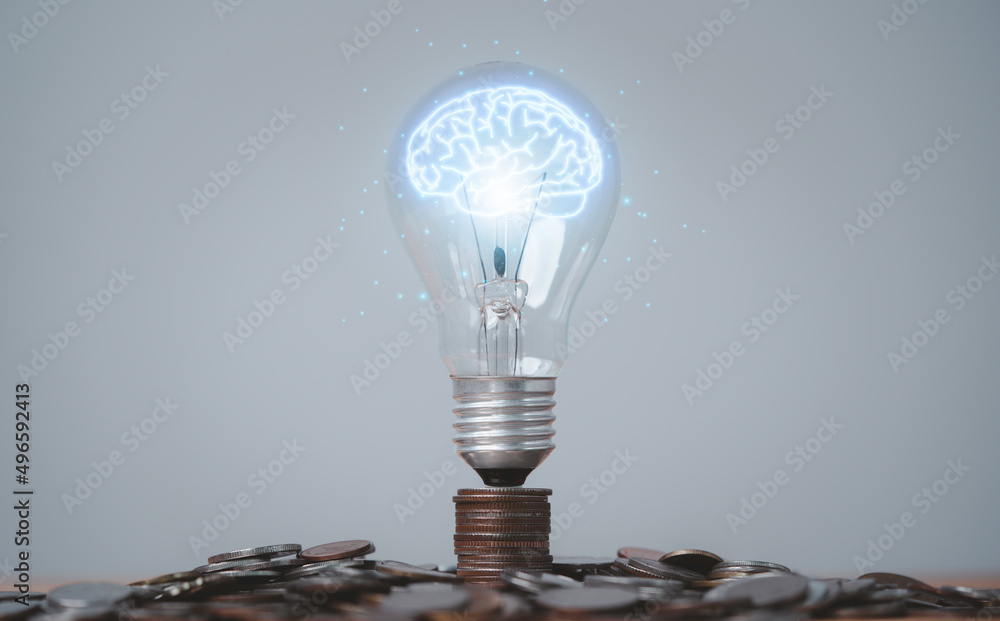 Aufkleber glowing virtual brain inside lightbulb on coin stacking for creative thinking idea and innovation ca