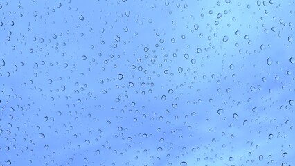 Drop water on blue sky background