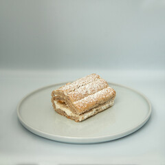 Slice of cake on isolated white background.
