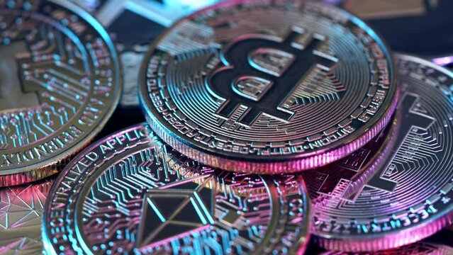 Digital Currency, Cryptocurrency, background, Shiny silver and golden physical cryptocurrencies Bitcoin symbol .