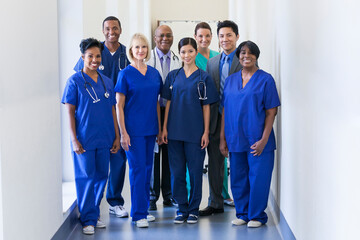 Fototapeta Smiling portrait multi ethnic team providing healthcare modern medical facility obraz