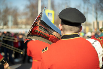 Obraz premium Military band in parade. Trumpeters on street. Trumpeter plays tune. Orchestra in Russia.