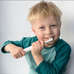 boy brushing his teeth