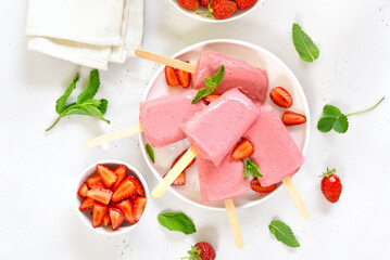 Strawberry ice cream popsicles
