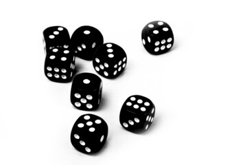 close up of black dices isolated on white