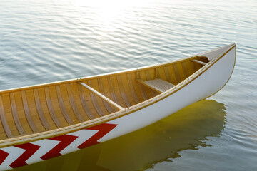 canoe wooden for outdoor activities on the water on a sunny day, the concept of outdoor activities 