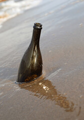 bottle beached on the seashore that could contain a message as well as a map of a treasure hidden...