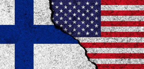 USA and Finland. Flags painted on cracked concrete wall. United States, America. Partnership, relationships and conflict concept. Banner background photo