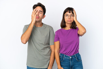 Young couple isolated on isolated white background with surprise and shocked facial expression