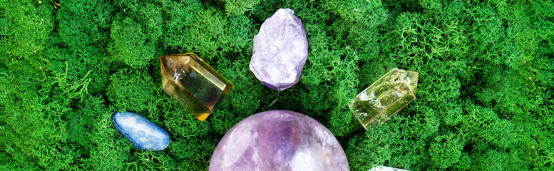 Healing crystals on brown background