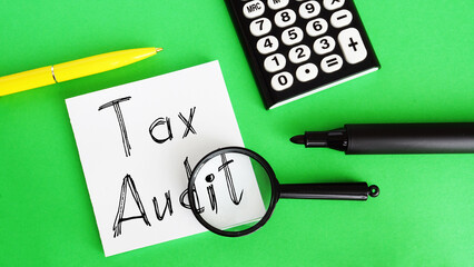 Tax audit is shown on the business photo using the text