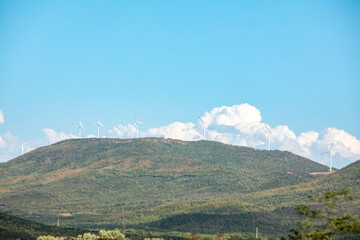 Fototapeta na wymiar wind plant green energy at Greece mountains