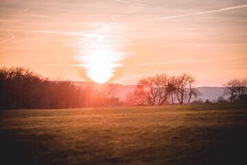 Fototapeta premium Landschaft im Sonnenuntergang