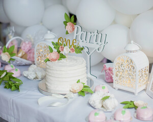 First birthday cake with white cream