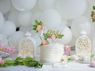 First birthday cake with white cream