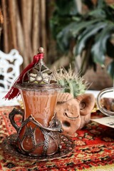 Indian fruit tea on wood background