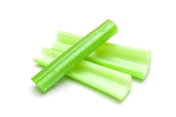Fresh Chopped Celery Sticks with Water Drops Isolated on White Background. Vegan and Vegetarian Culture. Raw Food. Healthy Diet with Negative Calorie Content