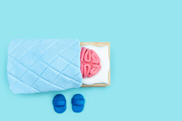 Plasticine pink human brain is sleeping. Mind rest concept.