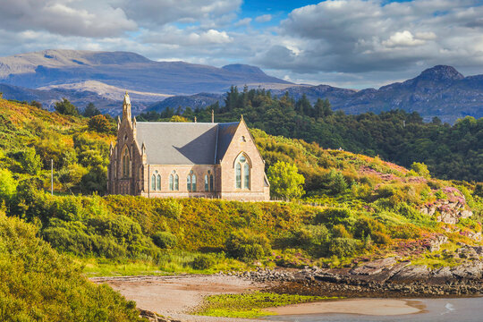Gairloch Free church of Scotland on the banks of Gairloch in the Highlands of Scotland with woodland behind, Gairloch, Scotland