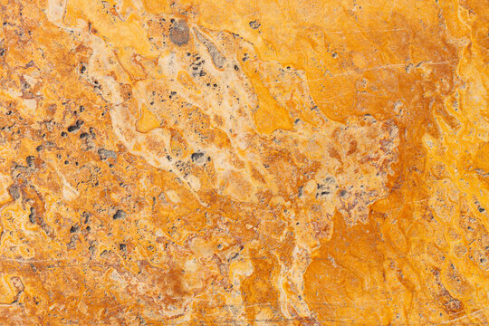 Abstract cracked textured background. Orange marble texture background
